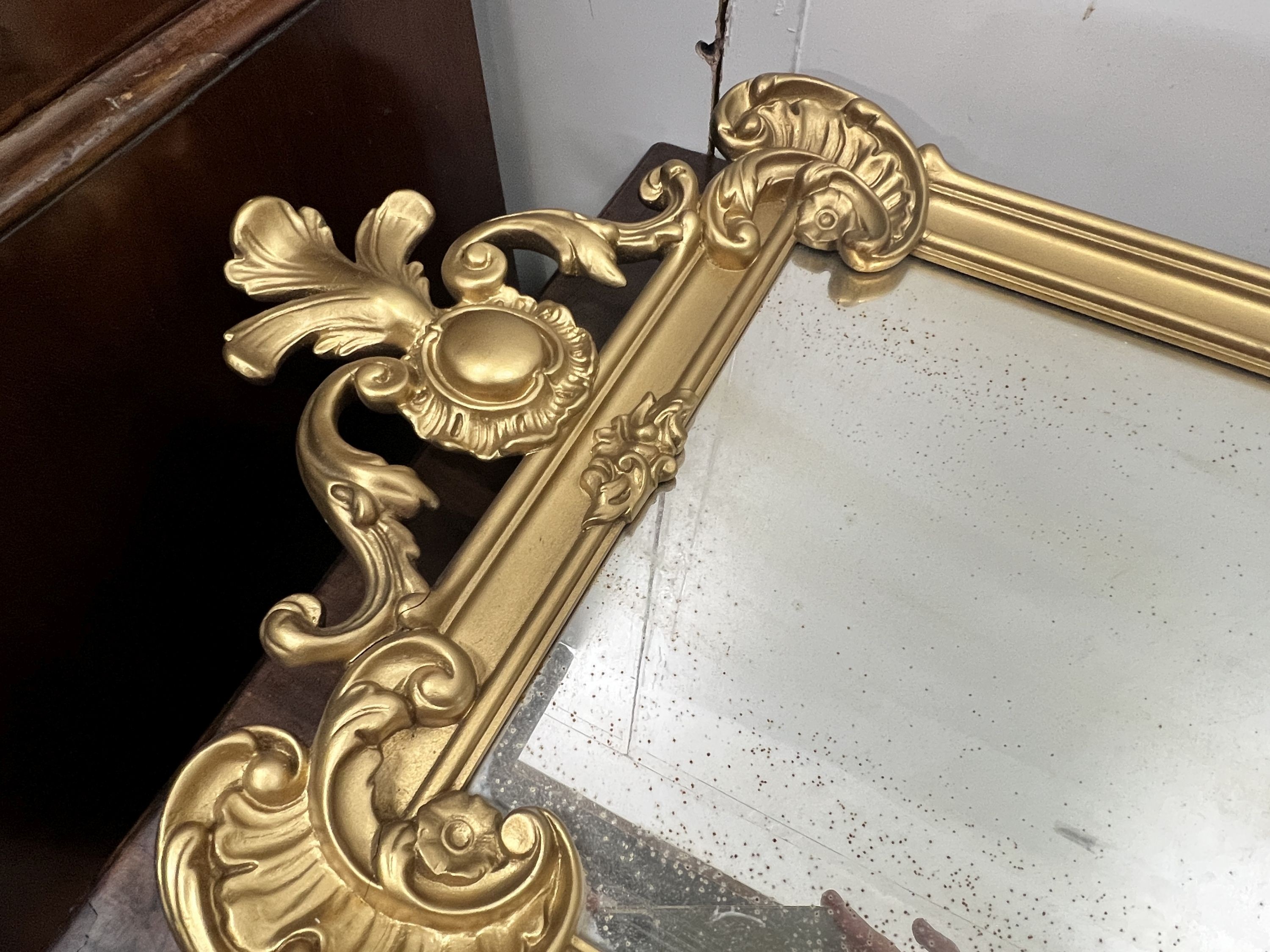 A rectangular giltwood and gesso pier glass, width 41cm, height 94cm